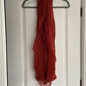 Orange tasseled infinity scarf